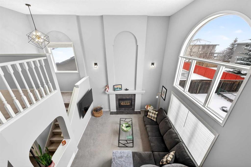 60 Citadel Ridge Close Nw, Calgary, AB - Indoor Photo Showing Other Room With Fireplace