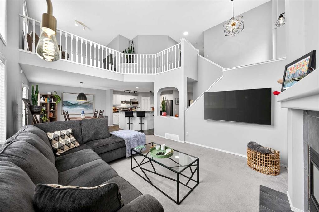 60 Citadel Ridge Close Nw, Calgary, AB - Indoor Photo Showing Living Room With Fireplace
