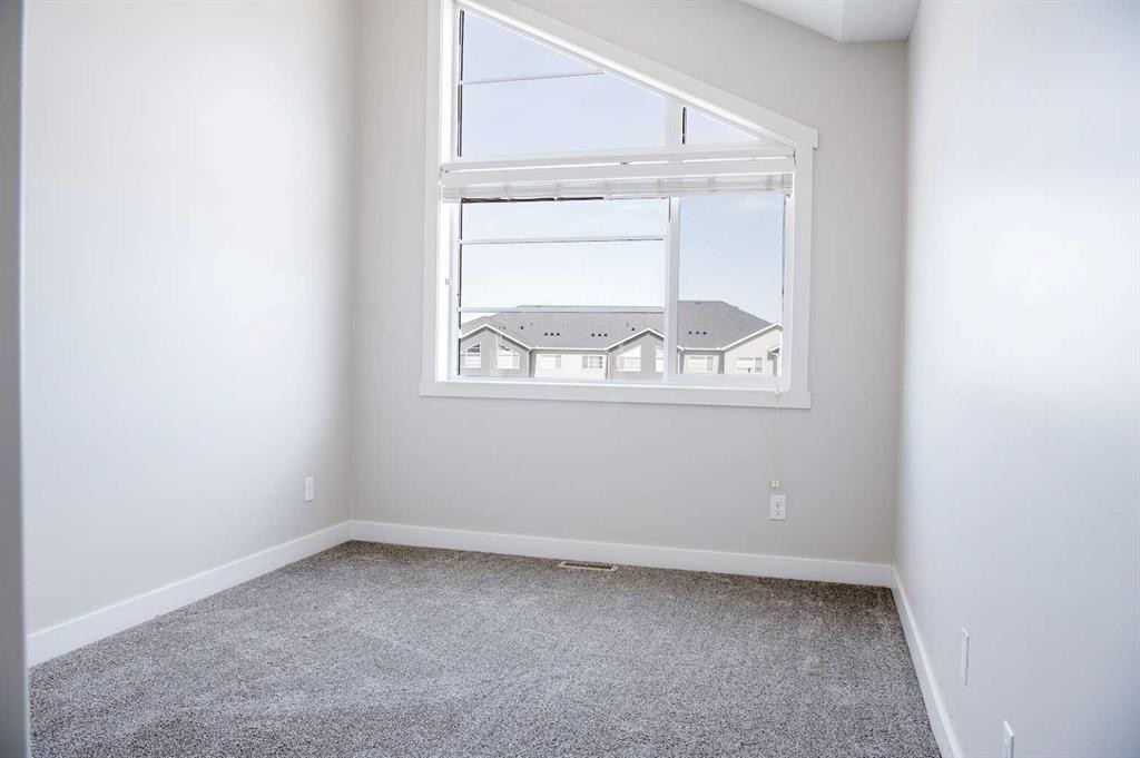 206 Redstone View Ne, Calgary, AB - Indoor Photo Showing Other Room