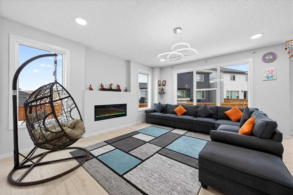 318 Walcrest Way Se, Calgary, AB - Indoor Photo Showing Living Room With Fireplace