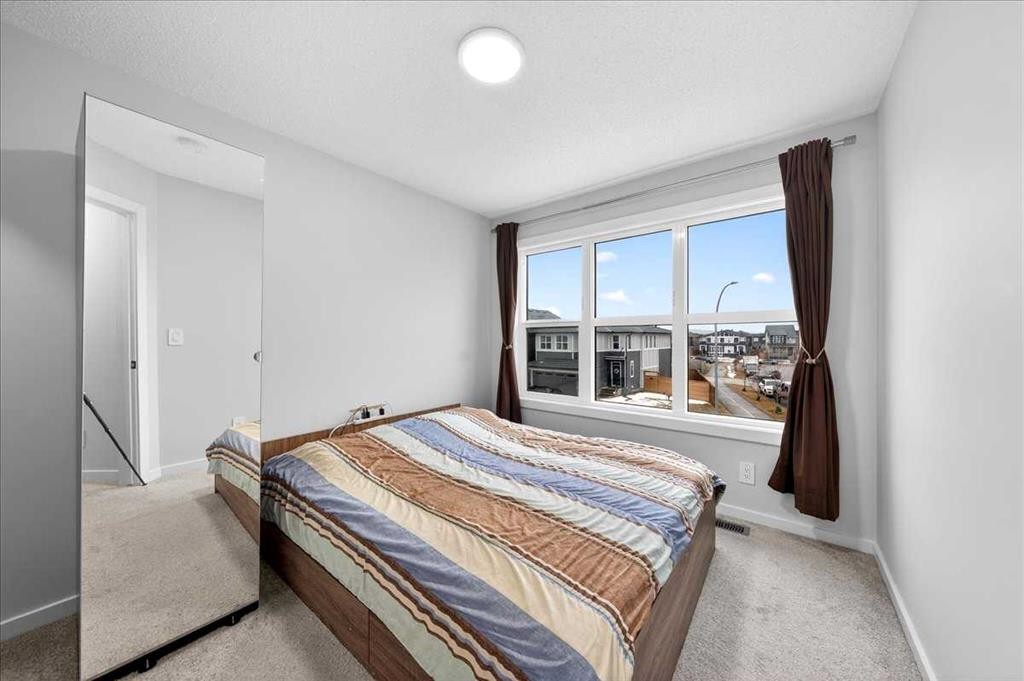 318 Walcrest Way Se, Calgary, AB - Indoor Photo Showing Bedroom