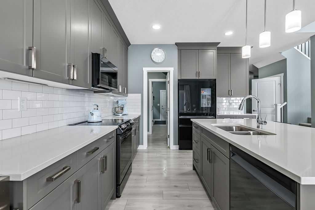 5 Birch Glen, Okotoks, AB - Indoor Photo Showing Kitchen With Double Sink With Upgraded Kitchen