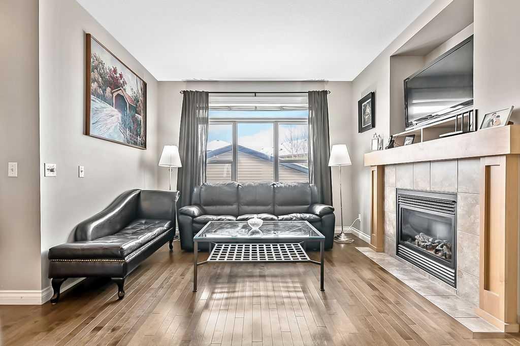 280 Copperstone Gardens Se, Calgary, AB - Indoor Photo Showing Living Room With Fireplace