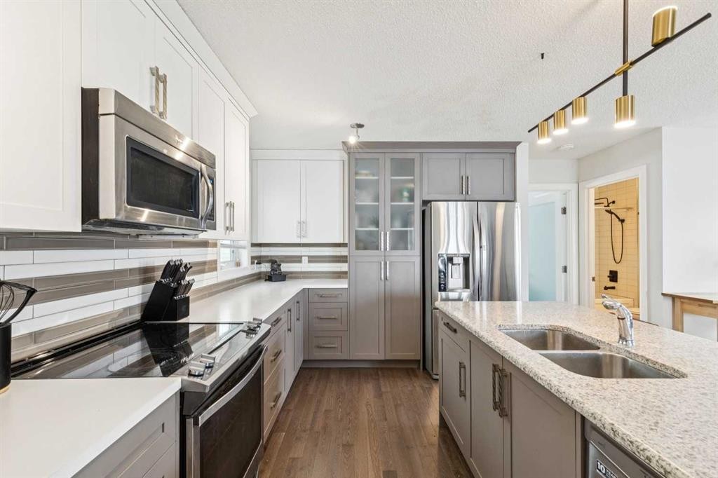 60 Erin Meadow Way Se, Calgary, AB - Indoor Photo Showing Kitchen With Double Sink With Upgraded Kitchen