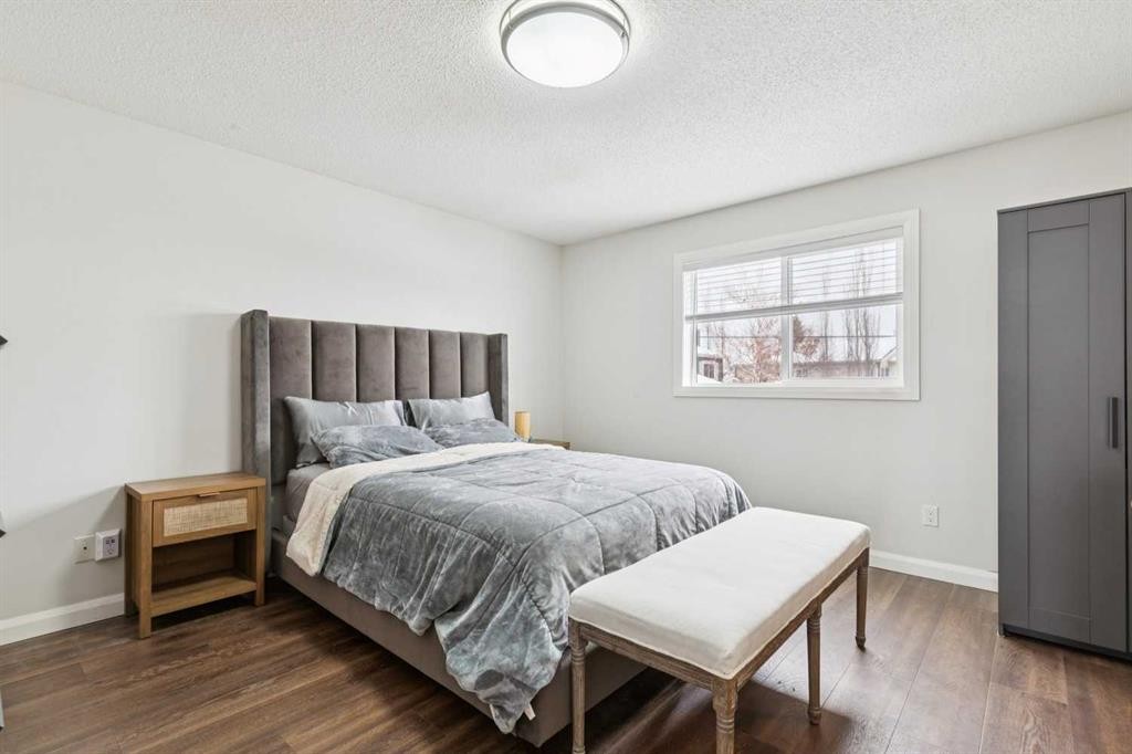 60 Erin Meadow Way Se, Calgary, AB - Indoor Photo Showing Bedroom