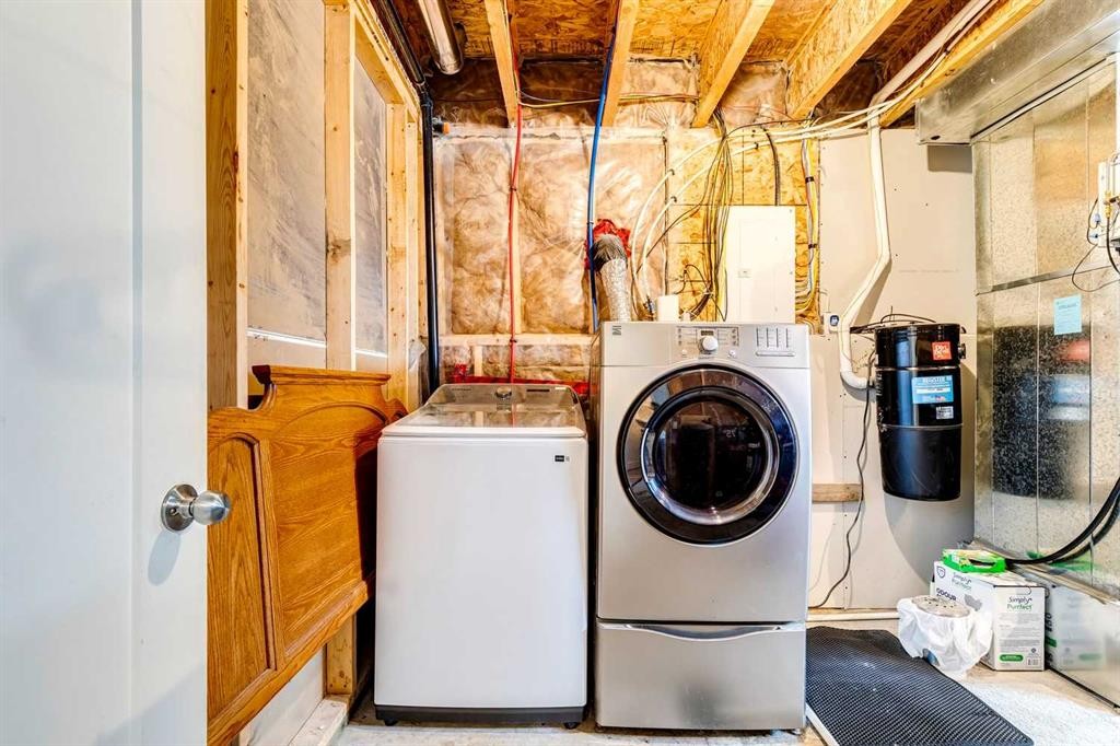 60 Erin Meadow Way Se, Calgary, AB - Indoor Photo Showing Laundry Room