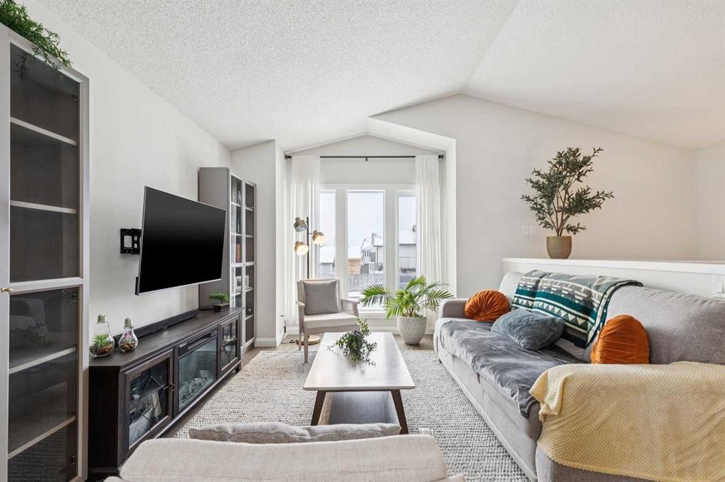 60 Erin Meadow Way Se, Calgary, AB - Indoor Photo Showing Living Room