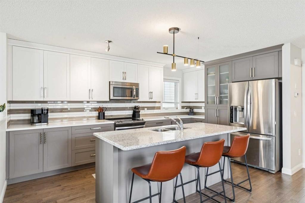 60 Erin Meadow Way Se, Calgary, AB - Indoor Photo Showing Kitchen With Double Sink With Upgraded Kitchen