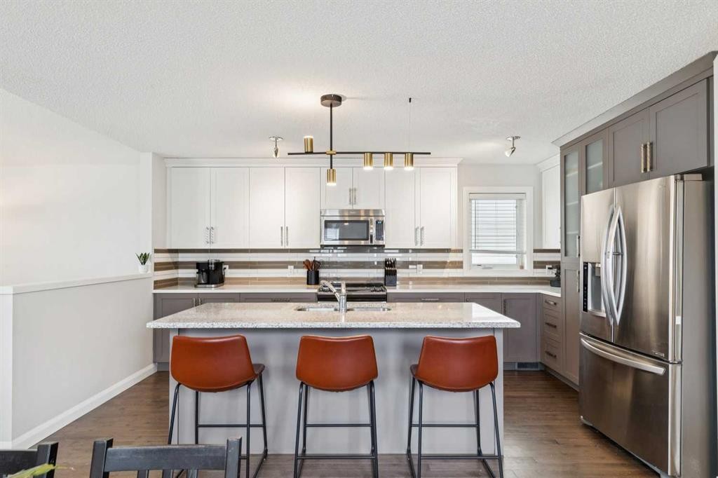 60 Erin Meadow Way Se, Calgary, AB - Indoor Photo Showing Kitchen With Double Sink With Upgraded Kitchen