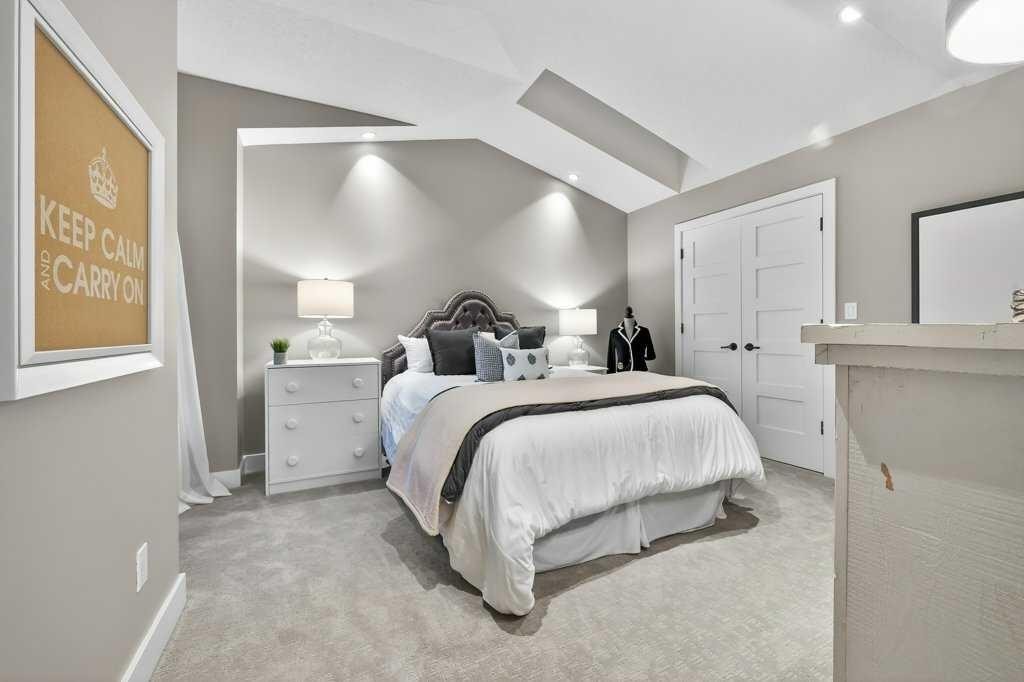 55 Cougar Plateau Circle Sw, Calgary, AB - Indoor Photo Showing Bedroom