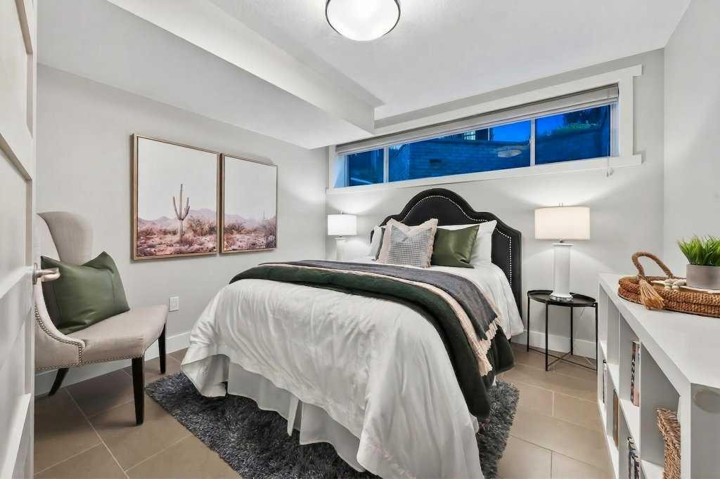 55 Cougar Plateau Circle Sw, Calgary, AB - Indoor Photo Showing Bedroom