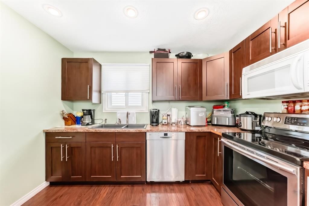 36 Castleglen Way Ne, Calgary, AB - Indoor Photo Showing Kitchen With Double Sink