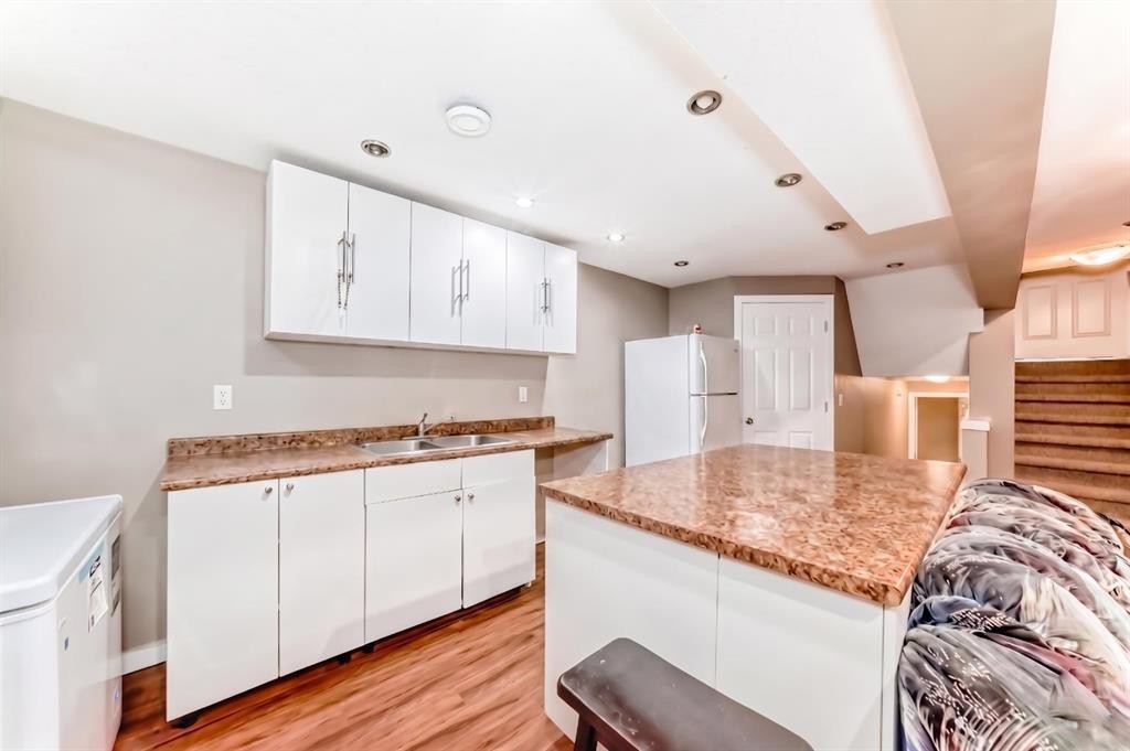36 Castleglen Way Ne, Calgary, AB - Indoor Photo Showing Kitchen With Double Sink