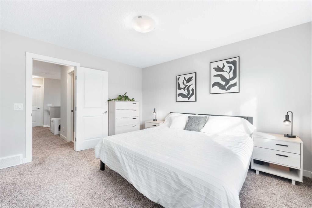 174 Seton Grove Se, Calgary, AB - Indoor Photo Showing Bedroom