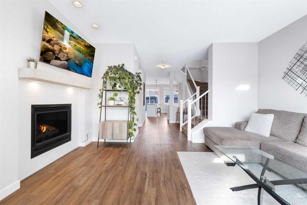 174 Seton Grove Se, Calgary, AB - Indoor Photo Showing Living Room With Fireplace