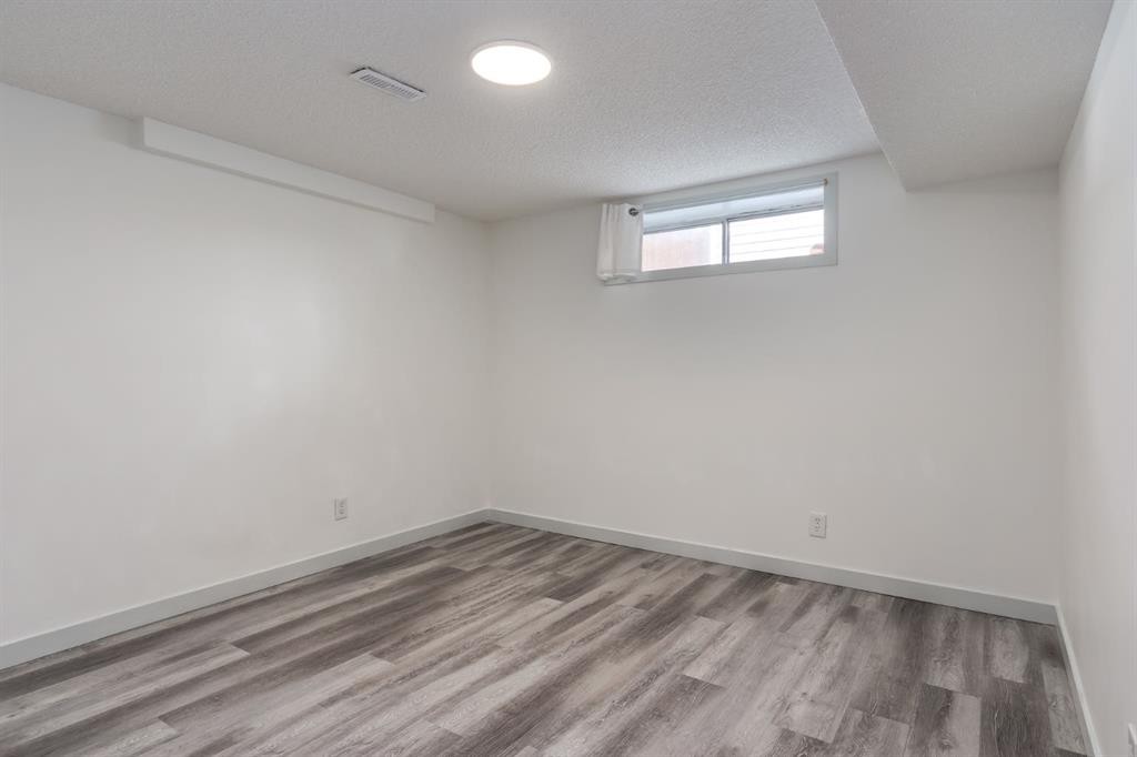 303 Coventry Close Ne, Calgary, AB - Indoor Photo Showing Other Room