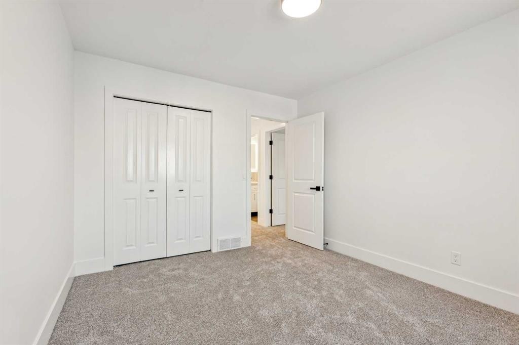 5 Mckenzie Lake Point Se, Calgary, AB - Indoor Photo Showing Other Room