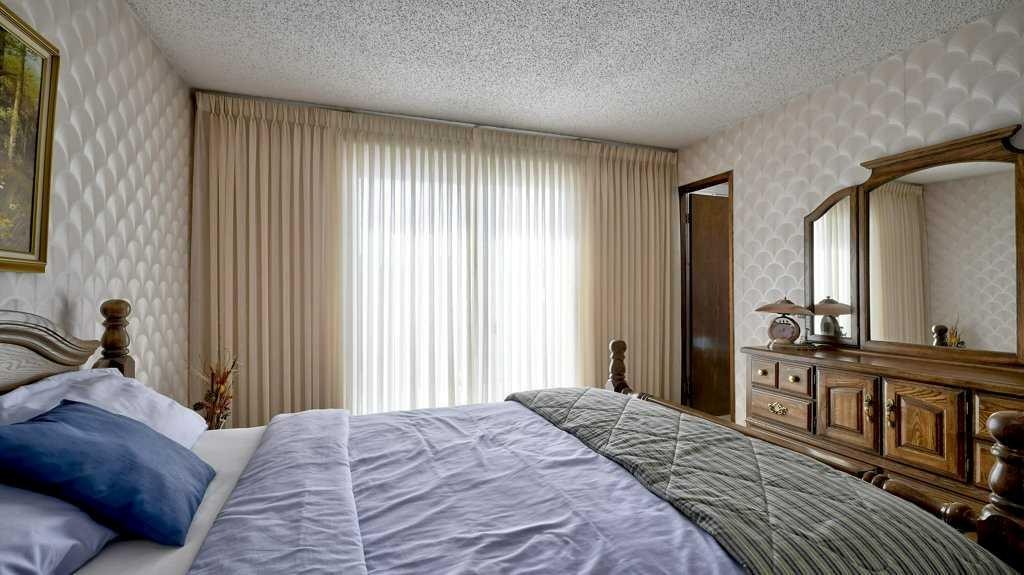 103 Rundlehorn Crescent Ne, Calgary, AB - Indoor Photo Showing Bedroom