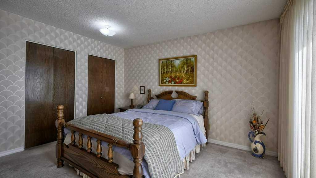 103 Rundlehorn Crescent Ne, Calgary, AB - Indoor Photo Showing Bedroom