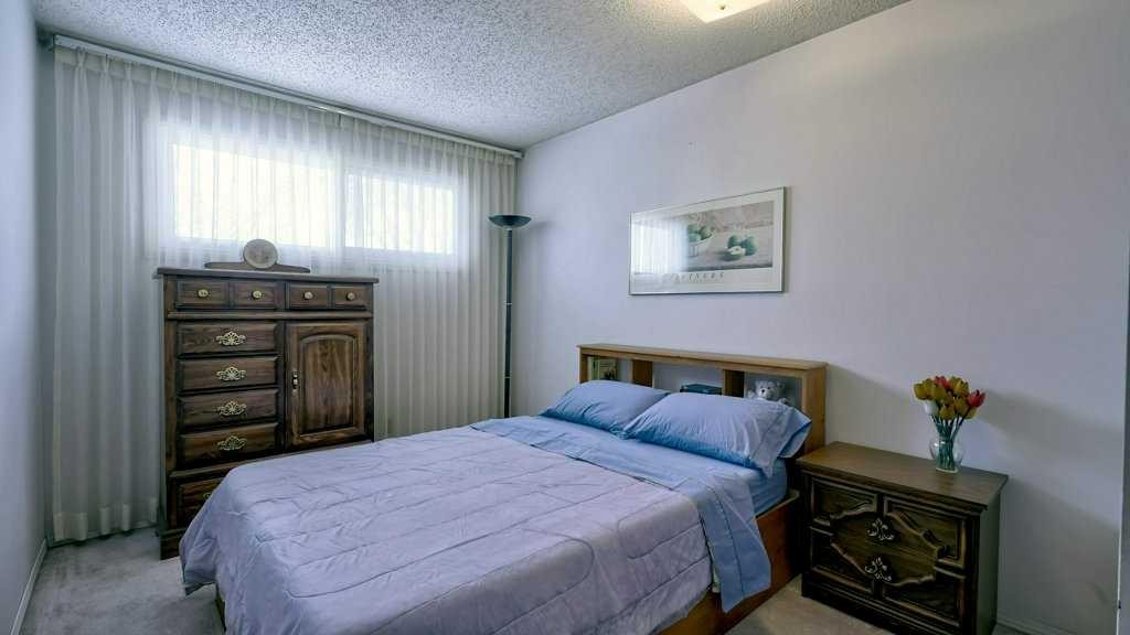 103 Rundlehorn Crescent Ne, Calgary, AB - Indoor Photo Showing Bedroom