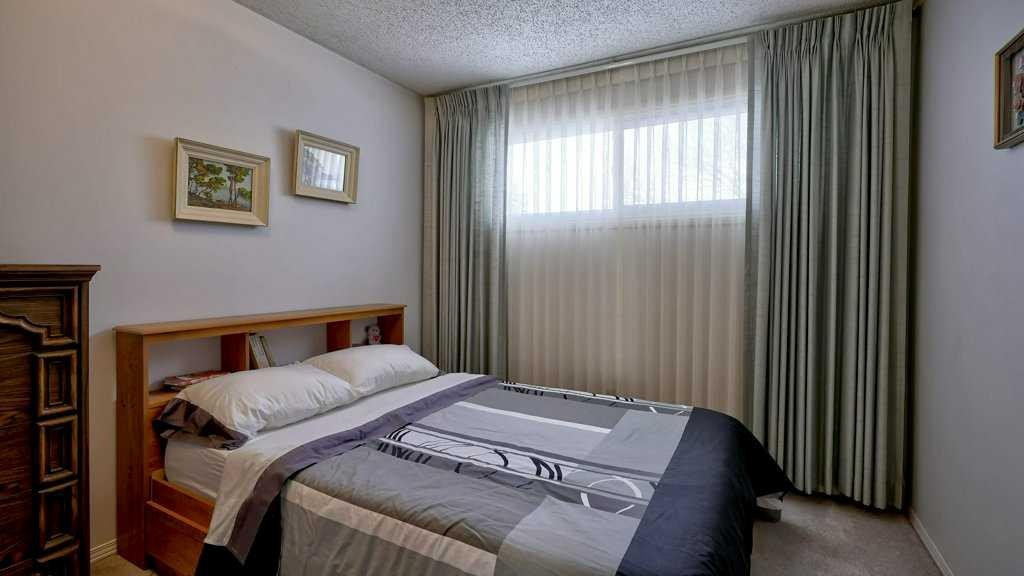 103 Rundlehorn Crescent Ne, Calgary, AB - Indoor Photo Showing Bedroom