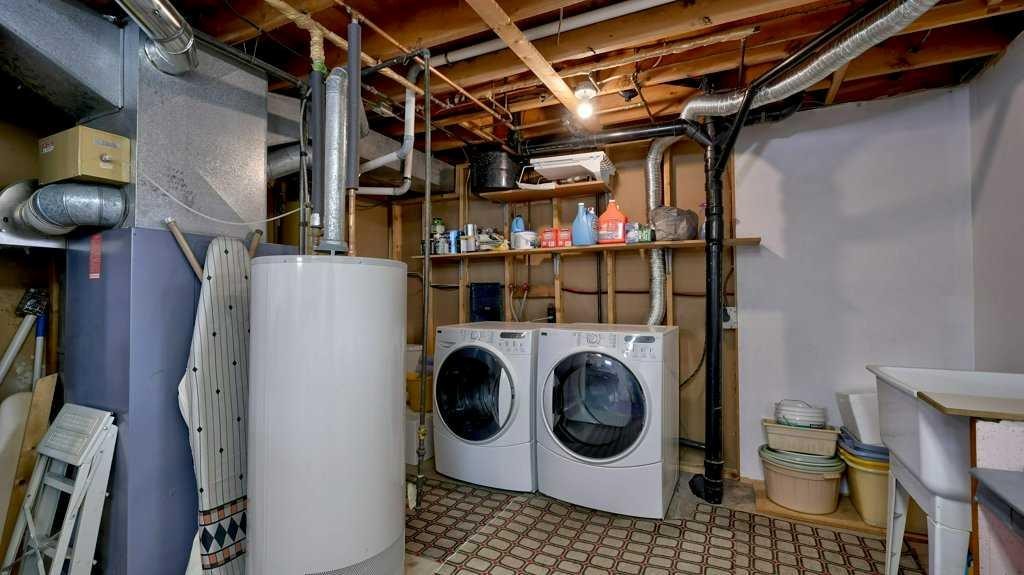 103 Rundlehorn Crescent Ne, Calgary, AB - Indoor Photo Showing Laundry Room