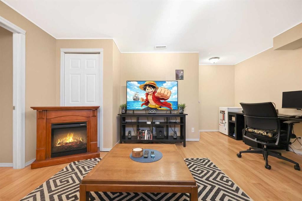 40 Eversyde Circle Sw, Calgary, AB - Indoor With Fireplace