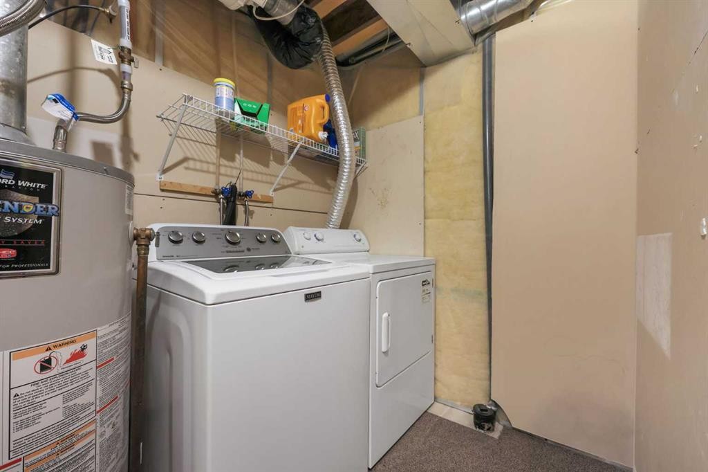 40 Eversyde Circle Sw, Calgary, AB - Indoor Photo Showing Laundry Room