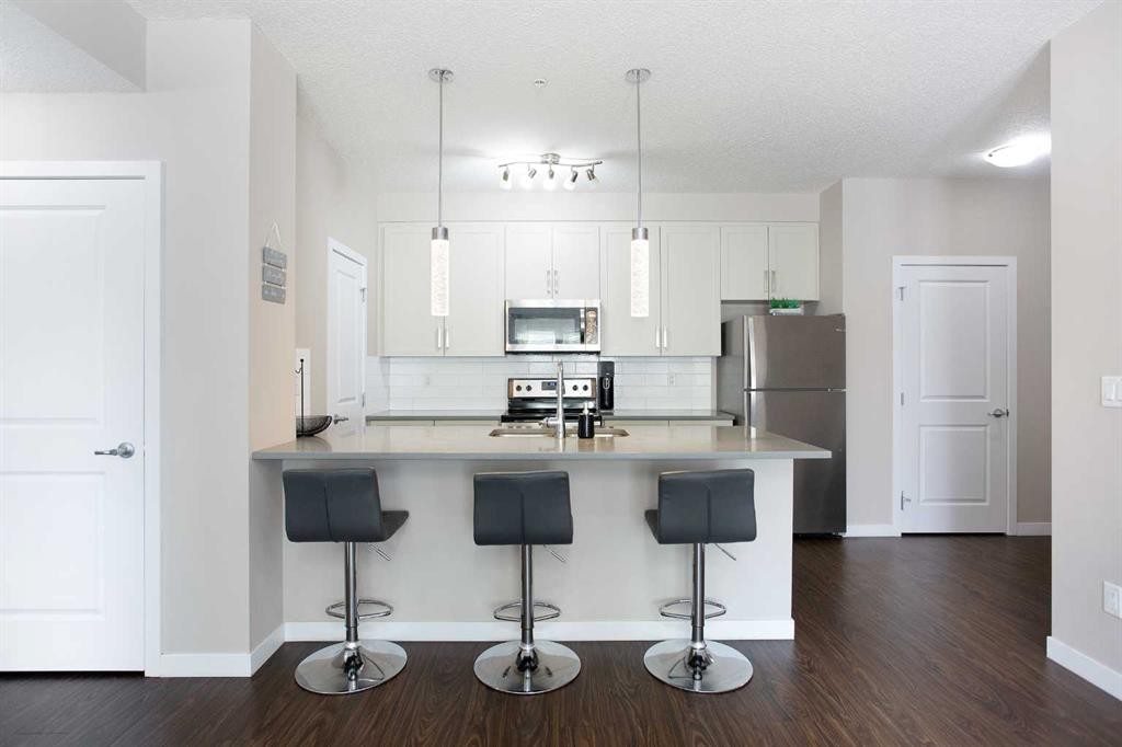 112-200 Cranfield Common Se, Calgary, AB - Indoor Photo Showing Kitchen With Upgraded Kitchen