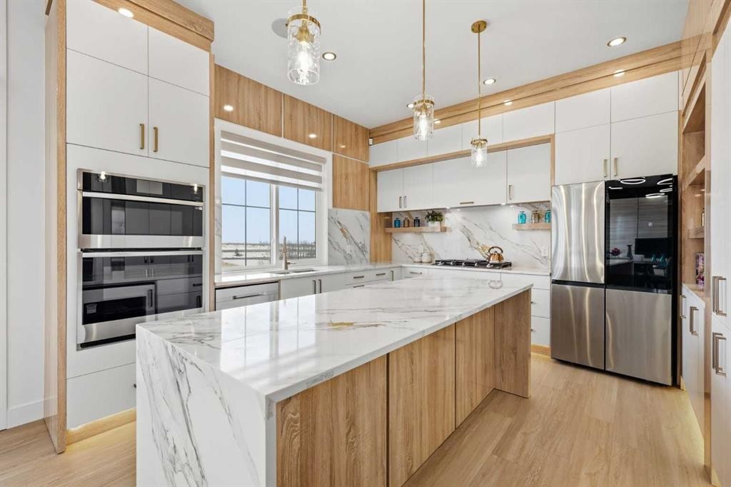 230 Royal Birch View Nw, Calgary, AB - Indoor Photo Showing Kitchen With Upgraded Kitchen