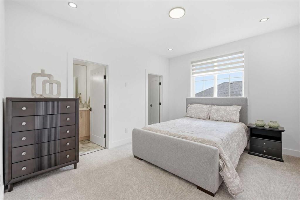 230 Royal Birch View Nw, Calgary, AB - Indoor Photo Showing Bedroom