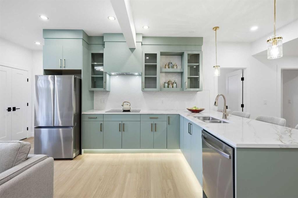 230 Royal Birch View Nw, Calgary, AB - Indoor Photo Showing Kitchen With Stainless Steel Kitchen With Double Sink With Upgraded Kitchen