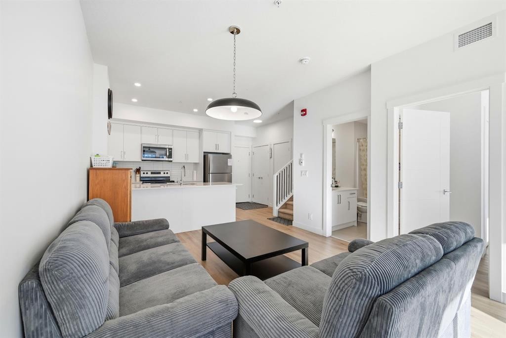 2216-151 Skyview Bay Ne, Calgary, AB - Indoor Photo Showing Living Room