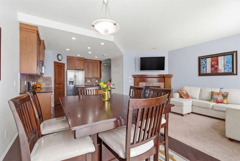 512 Panatella Square Nw, Calgary, AB - Indoor Photo Showing Dining Room