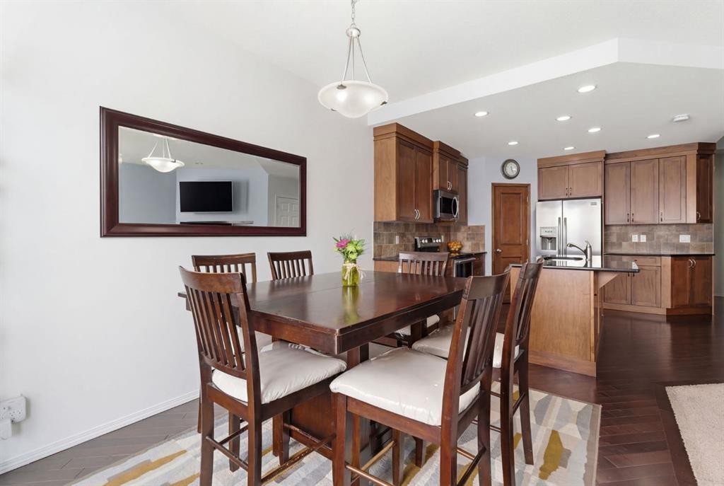 512 Panatella Square Nw, Calgary, AB - Indoor Photo Showing Dining Room