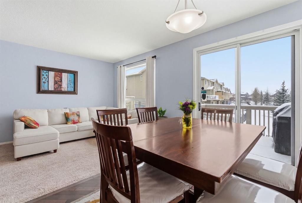 512 Panatella Square Nw, Calgary, AB - Indoor Photo Showing Dining Room