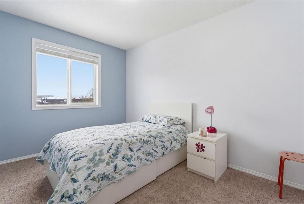 512 Panatella Square Nw, Calgary, AB - Indoor Photo Showing Bedroom