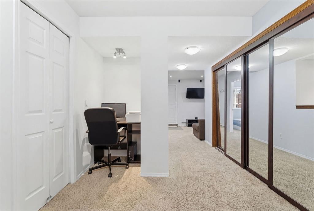 512 Panatella Square Nw, Calgary, AB - Indoor Photo Showing Other Room