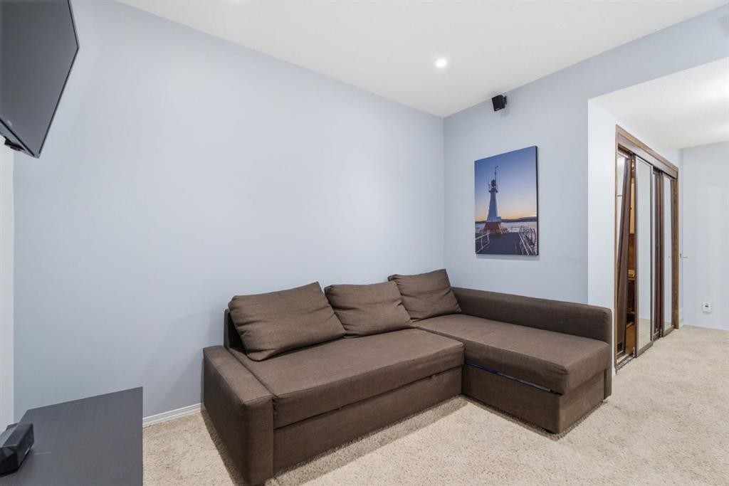 512 Panatella Square Nw, Calgary, AB - Indoor Photo Showing Other Room