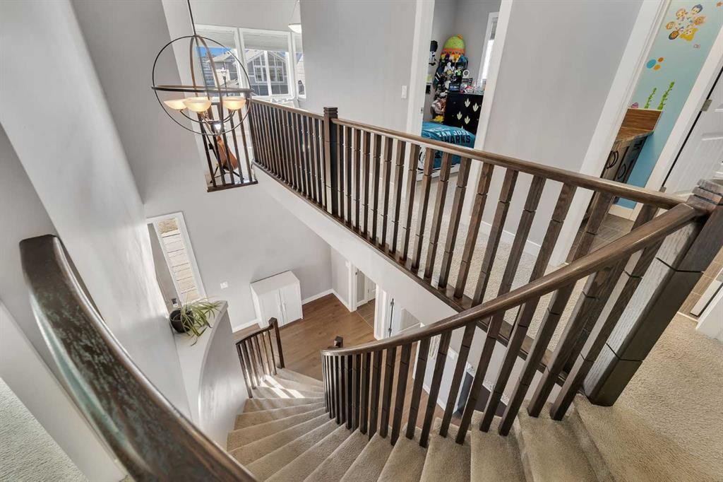 140 Rainbow Falls Heath, Chestermere, AB - Indoor Photo Showing Other Room