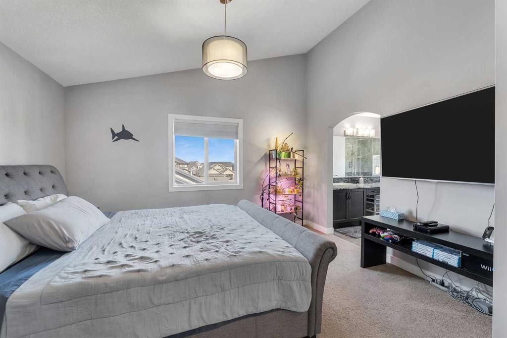 140 Rainbow Falls Heath, Chestermere, AB - Indoor Photo Showing Bedroom