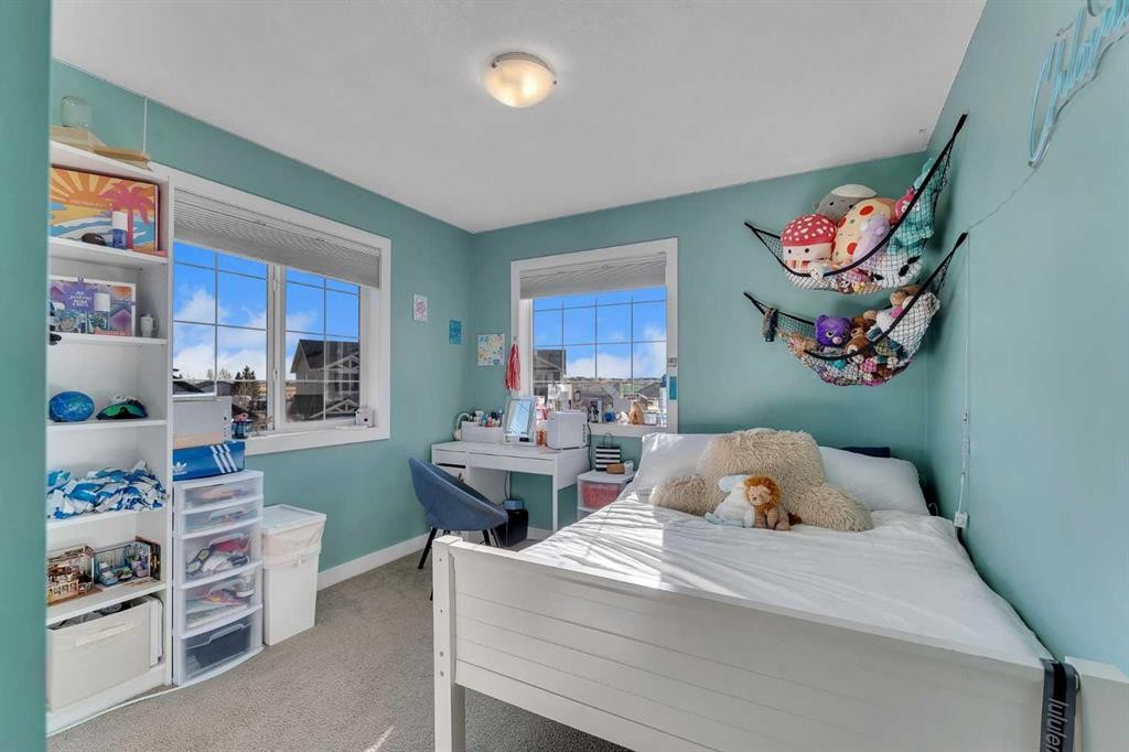 140 Rainbow Falls Heath, Chestermere, AB - Indoor Photo Showing Bedroom
