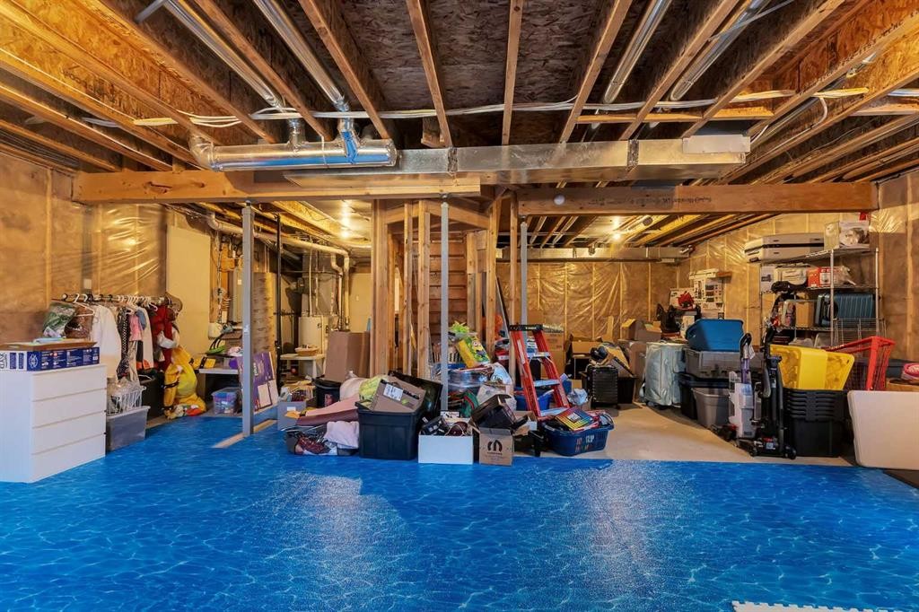 140 Rainbow Falls Heath, Chestermere, AB - Indoor Photo Showing Basement