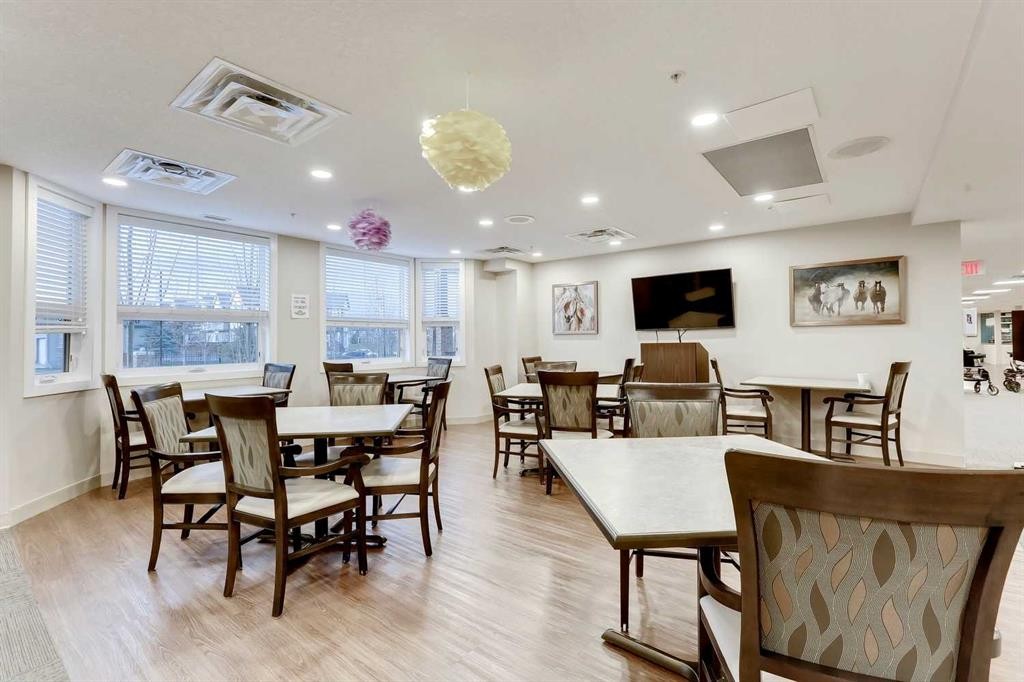 404-2635 Eversyde Avenue Sw, Calgary, AB - Indoor Photo Showing Dining Room