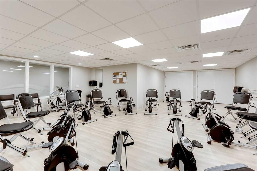 404-2635 Eversyde Avenue Sw, Calgary, AB - Indoor Photo Showing Gym Room