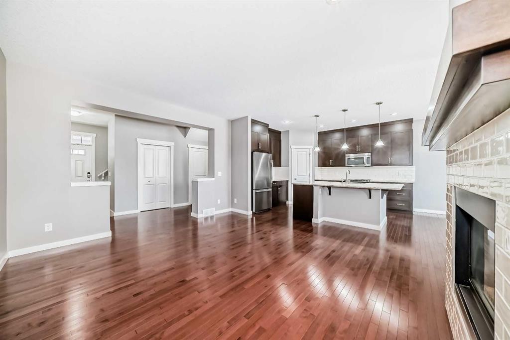 112 Chaparral Valley View Se, Calgary, AB - Indoor Photo Showing Other Room With Fireplace