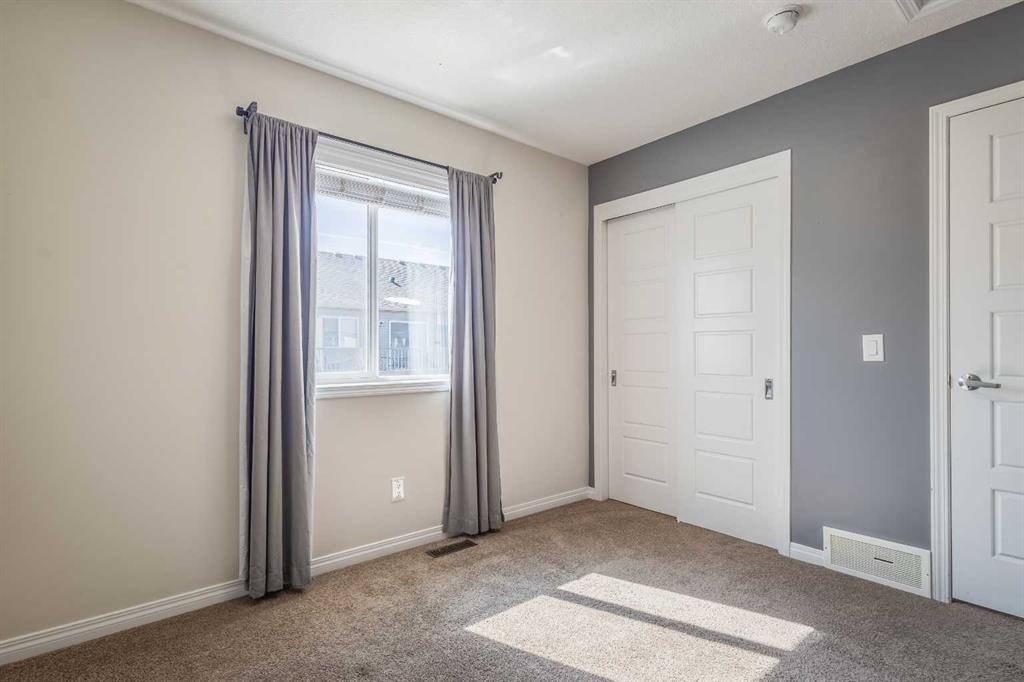 271 Windford Crescent Sw, Airdrie, AB - Indoor Photo Showing Other Room