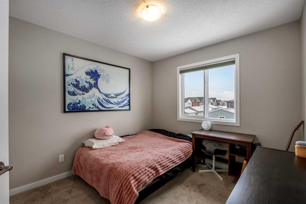 265 Seton Circle Se, Calgary, AB - Indoor Photo Showing Bedroom