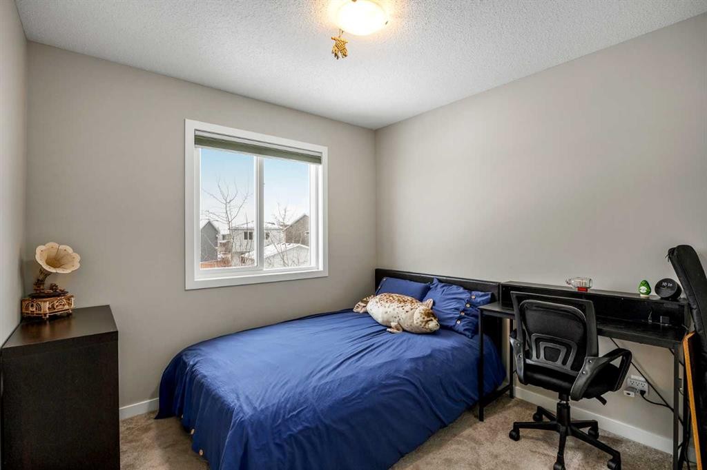 265 Seton Circle Se, Calgary, AB - Indoor Photo Showing Bedroom