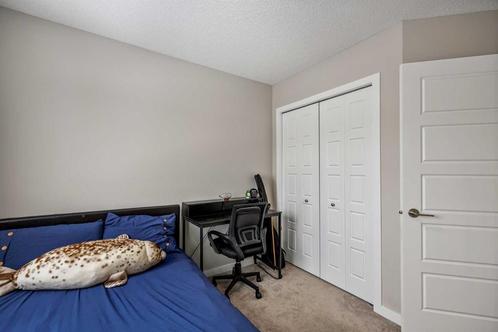 265 Seton Circle Se, Calgary, AB - Indoor Photo Showing Bedroom